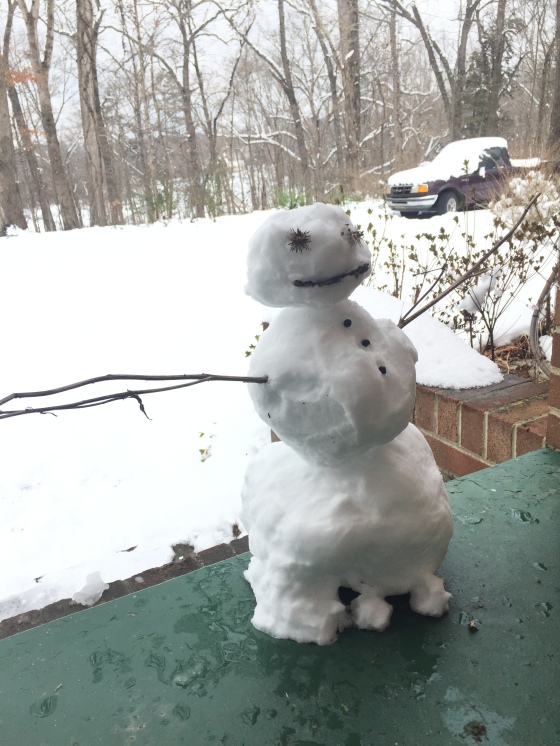 Since she was still getting over some sickness I built her a snowman on the side porch so she could see him.
